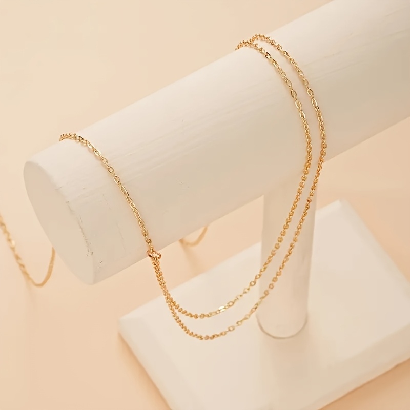 حزام خصر معدني ذهبي مزدوج الطب - مراجعة Body Jewelry For You وسعره